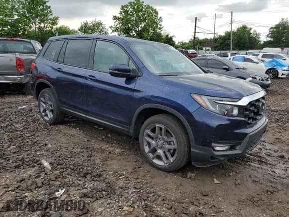 2022 Honda Passport EX-L with VIN 5FNYF8H54NB023046, listed as a Copart auction lot 63494925 with 27,245 mi miles and Salvage title. Bid and sale history available at DreamBid. Image 4.