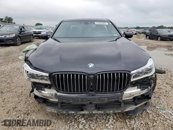 2017 BMW 7 Series 750i with VIN WBA7F0C39HGM21864, listed as a Copart auction lot 61645304 with Not provided miles and Salvage title. Bid and sale history available at DreamBid. Image 5.