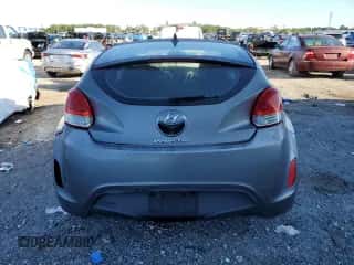 2012 Hyundai Veloster w/Black Int z VIN KMHTC6AD0CU023084, wystawiony jako Copart lot #82597005 z przebiegiem 187 990 mil mil oraz Czysty tytuł • Clean title. Historia ofert i sprzedaży dostępna na DreamBid. Obrazek 6.