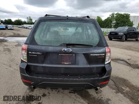 2010 Subaru Forester X с VIN JF2SH6ACXAH705941, выставлен на аукционе Copart как лот 63797135 с пробегом 151 167 миль миль и Списание • Salvage title. История ставок и продаж доступна на DreamBid. Изображение 6.