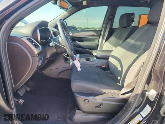 2014 Jeep Grand Cherokee Laredo with VIN 1C4RJEAG0EC322270, listed as a Copart auction lot 60334555 with 114,115 mi miles and Salvage title. Bid and sale history available at DreamBid. Image 7.