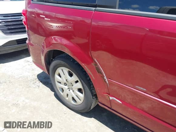 2016 Dodge Grand Caravan American Value with VIN 2C4RDGBG6GR182382, listed as a IAAI auction lot 42796261 with 230,502 mi miles and . Bid and sale history available at DreamBid. Image 12.