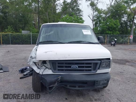 2005 Ford Econoline Cargo with VIN 1FTRE14W75HA41442, listed as a IAAI auction lot 42438411 with 197,241 mi miles and . Bid and sale history available at DreamBid. Image 6.