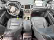 2014 Jeep Grand Cherokee Laredo с VIN 1C4RJEAGXEC145629, выставлен на аукционе Copart как лот 70733045 с пробегом 125 145 миль миль и Списание • Salvage title. История ставок и продаж доступна на DreamBid. Изображение 8.