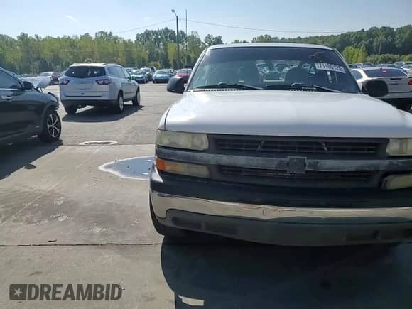 1999 Chevrolet Silverado 1500 с VIN 1GCEC14W9XE200521, выставлен на аукционе Copart как лот 71100125 с пробегом 339 452 миль миль и Списание • Salvage title. История ставок и продаж доступна на DreamBid. Изображение 13.