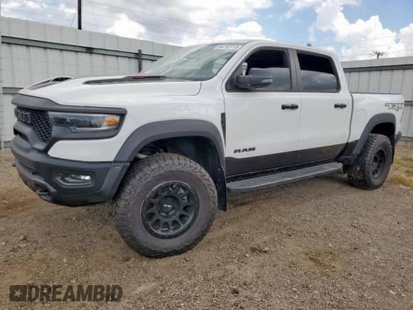 2023 Ram 1500 TRX z VIN 1C6SRFU92PN500501, wystawiony jako Copart lot #64792715 z przebiegiem 23 653 mil mil oraz Szkoda całkowita • Salvage title. Historia ofert i sprzedaży dostępna na DreamBid. Obrazek 1.