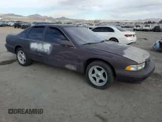 1996 Chevrolet Caprice 1SA Special Value z VIN 1G1BL52P2TR169565, wystawiony jako Copart lot #85153704 z przebiegiem 82 365 mil mil oraz Szkoda całkowita • Salvage title. Historia ofert i sprzedaży dostępna na DreamBid. Obrazek 4.