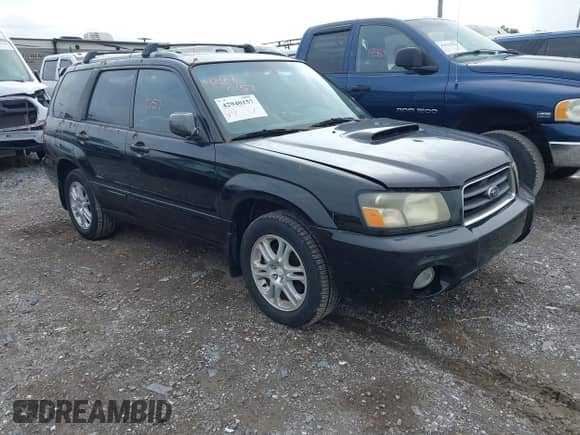 2004 Subaru Forester XT with VIN JF1SG69654H730661, listed as a IAAI auction lot 42940157 with 130,964 mi miles and . Bid and sale history available at DreamBid. Image 1.