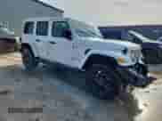 2024 Jeep Wrangler Sahara with VIN 1C4RJXP63RW215504, listed as a Copart auction lot 60795235 with 13,631 mi miles and Salvage title. Bid and sale history available at DreamBid. Image 4.