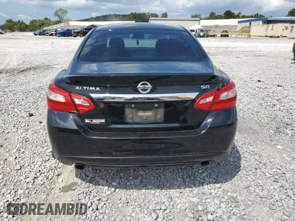2016 Nissan Altima SR z VIN 1N4AL3AP4GC218501, wystawiony jako Copart lot #65929585 z przebiegiem 188 976 mil mil oraz Szkoda całkowita • Salvage title. Historia ofert i sprzedaży dostępna na DreamBid. Obrazek 6.