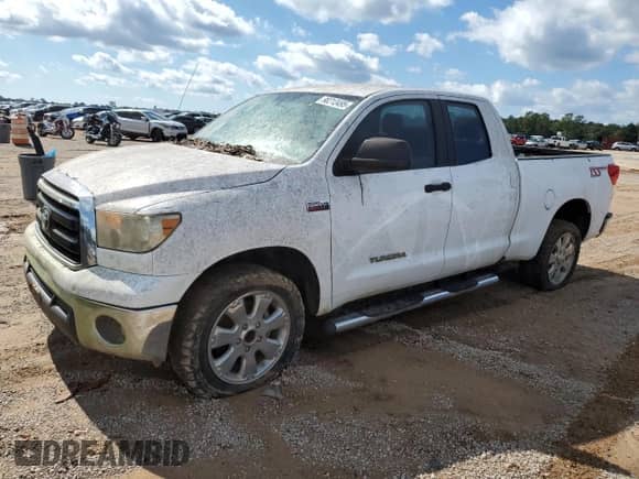 2010 Toyota Tundra with VIN 5TFRY5F17AX077101, listed as a Copart auction lot 90313495 with 174,794 mi miles and Clean title. Bid and sale history available at DreamBid. Image 1.