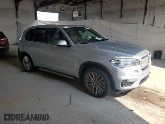 2017 BMW X5 xDrive35i with VIN 5UXKR0C33H0V75465, listed as a Copart auction lot 65876185 with 86,240 mi miles and Salvage title. Bid and sale history available at DreamBid. Image 4.