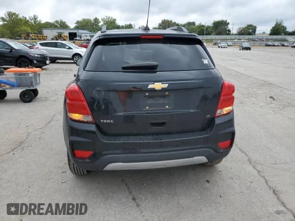 2017 Chevrolet Trax LT с VIN 3GNCJLSB4HL256464, выставлен на аукционе Copart как лот 83767615 с пробегом 156 421 миль миль и Списание • Salvage title. История ставок и продаж доступна на DreamBid. Изображение 6.