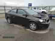 2014 Chevrolet Sonic LT z VIN 1G1JC5SG7E4106134, wystawiony jako Copart lot #80910575 z przebiegiem 149 644 mil mil oraz Szkoda całkowita • Salvage title. Historia ofert i sprzedaży dostępna na DreamBid. Obrazek 4.