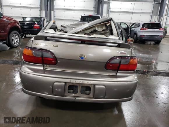 2002 Chevrolet Malibu LS с VIN 1G1NE52J12M656724, выставлен на аукционе Copart как лот 75007924 с пробегом Не указан миль и На запчасти • Non repairable. История ставок и продаж доступна на DreamBid. Изображение 6.