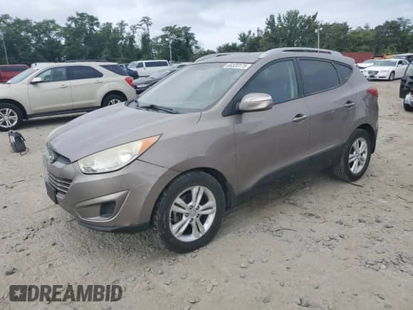 2012 Hyundai Tucson GLS z VIN KM8JU3AC8CU435358, wystawiony jako Copart lot #68320175 z przebiegiem 139 205 mil mil oraz Szkoda całkowita • Salvage title. Historia ofert i sprzedaży dostępna na DreamBid. Obrazek 1.