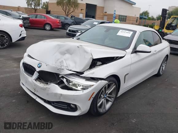 2016 BMW 4 Series 428i z VIN WBA3V7C55G5A24810, wystawiony jako IAAI lot #42357056 z przebiegiem 60 594 mil mil oraz . Historia ofert i sprzedaży dostępna na DreamBid. Obrazek 21.