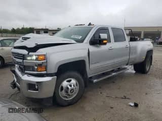 2019 Chevrolet Silverado 3500HD LTZ with VIN 1GC4KXCYXKF198611, listed as a Copart auction lot 66835485 with 124,274 mi miles and Salvage title. Bid and sale history available at DreamBid. Image 1.
