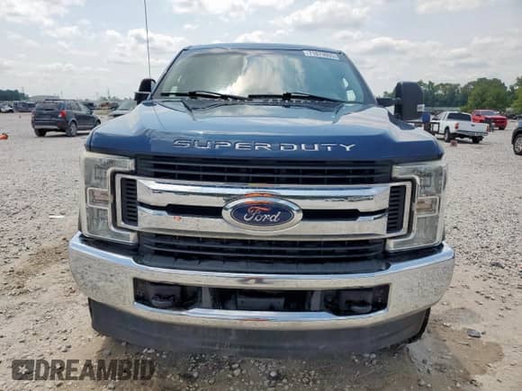 2017 Ford F-250 Lariat with VIN 1FT7W2BT4HEF11077, listed as a Copart auction lot 71873055 with 141,332 mi miles and Salvage title. Bid and sale history available at DreamBid. Image 5.