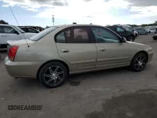 2005 Hyundai Elantra GLS z VIN KMHDN46D85U957203, wystawiony jako Copart lot #73895534 z przebiegiem 164 452 mil mil oraz Czysty tytuł • Clean title. Historia ofert i sprzedaży dostępna na DreamBid. Obrazek 3.