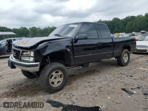 1997 GMC Sierra 1500 with VIN 1GTEK19R4VE502673, listed as a Copart auction lot 63619335 with 225,758 mi miles and Salvage title. Bid and sale history available at DreamBid. Image 1.