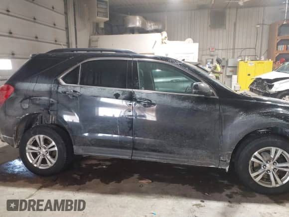 2013 Chevrolet Equinox LT z VIN 2GNFLNE39D6186532, wystawiony jako IAAI lot #41640256 z przebiegiem 159 678 mil mil oraz . Historia ofert i sprzedaży dostępna na DreamBid. Obrazek 13.