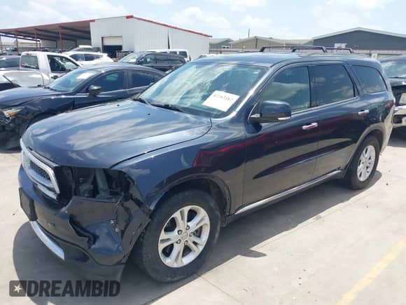 2013 Dodge Durango Crew with VIN 1C4SDHDTXDC564212, listed as a IAAI auction lot 42703182 with 158,398 mi miles and . Bid and sale history available at DreamBid. Image 2.
