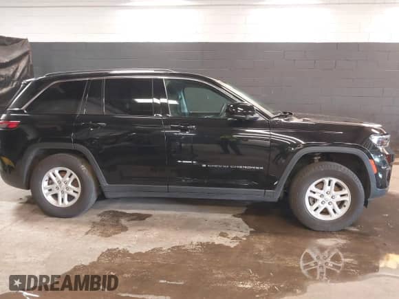 2023 Jeep Grand Cherokee Laredo with VIN 1C4RJHAG6PC535485, listed as a IAAI auction lot 41877701 with 19,563 mi miles and . Bid and sale history available at DreamBid. Image 13.
