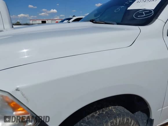 2022 Ram 1500 Tradesman z VIN 3C6RR7KG8NG211490, wystawiony jako IAAI lot #42747257 z przebiegiem 71 248 mil mil oraz . Historia ofert i sprzedaży dostępna na DreamBid. Obrazek 6.