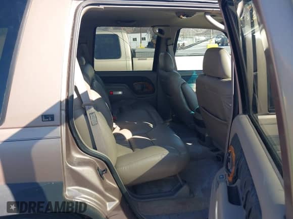 1996 Chevrolet Tahoe с VIN 1GNEK13R2TJ353037, выставлен на аукционе IAAI как лот 43416338 с пробегом 156 413 миль миль и . История ставок и продаж доступна на DreamBid. Изображение 8.