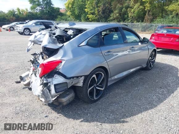 2020 Honda Accord Sport with VIN 1HGCV1F31LA121920, listed as a IAAI auction lot 43265202 with 130,296 mi miles and . Bid and sale history available at DreamBid. Image 4.