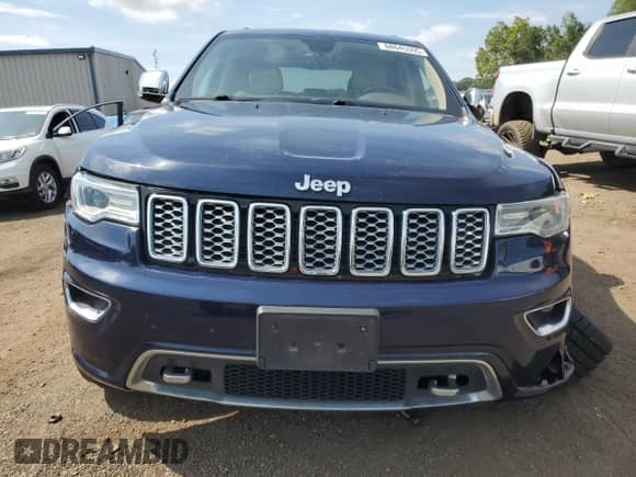 2018 Jeep Grand Cherokee Overland z VIN 1C4RJFCG2JC250517, wystawiony jako Copart lot #68645595 z przebiegiem 116 862 mil mil oraz Szkoda całkowita • Salvage title. Historia ofert i sprzedaży dostępna na DreamBid. Obrazek 5.
