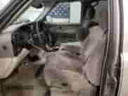 2000 Chevrolet Suburban with VIN 1GNFK16T9YJ169393, listed as a Copart auction lot 84970004 with 304,002 mi miles and Salvage title. Bid and sale history available at DreamBid. Image 7.