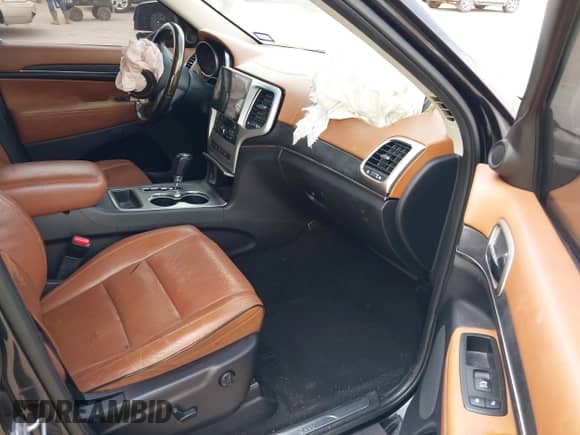 2012 Jeep Grand Cherokee Overland z VIN 1C4RJECT5CC157498, wystawiony jako IAAI lot #42414872 z przebiegiem 133 087 mil mil oraz . Historia ofert i sprzedaży dostępna na DreamBid. Obrazek 5.