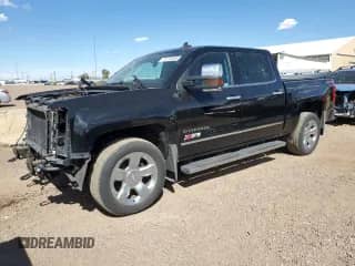 2018 Chevrolet Silverado 1500 LTZ with VIN 3GCUKSEJ7JG256156, listed as a Copart auction lot 71270455 with 132,336 mi miles and Salvage title. Bid and sale history available at DreamBid. Image 1.