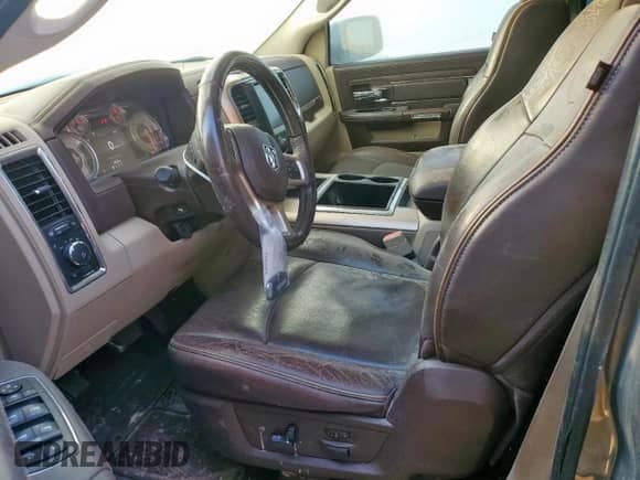 2014 Ram 1500 Longhorn z VIN 1C6RR6PT0ES457958, wystawiony jako Copart lot #66870965 z przebiegiem 219 785 mil mil oraz Szkoda całkowita • Salvage title. Historia ofert i sprzedaży dostępna na DreamBid. Obrazek 7.