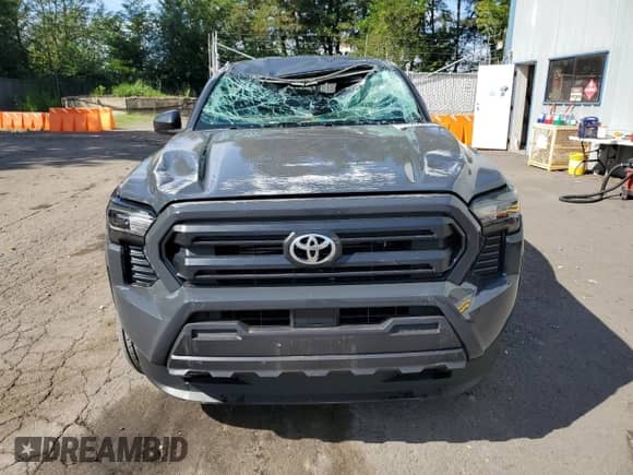 2024 Toyota Tacoma SR with VIN 3TYKD5HN0RT013601, listed as a Copart auction lot 69126575 with 4,033 mi miles and Salvage title. Bid and sale history available at DreamBid. Image 5.
