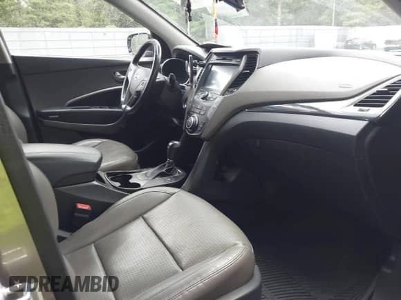 2015 Hyundai Santa Fe with VIN 5XYZWDLA2FG275504, listed as a IAAI auction lot 43030496 with 93,414 mi miles and . Bid and sale history available at DreamBid. Image 5.