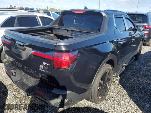 2023 Hyundai Santa Cruz Night Edition с VIN 5NTJCDAF4PH063669, выставлен на аукционе Copart как лот 73840874 с пробегом 47 766 миль миль и На запчасти • Non repairable. История ставок и продаж доступна на DreamBid. Изображение 3.