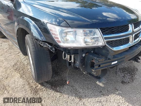 2014 Dodge Journey SXT with VIN 3C4PDCBG0ET141000, listed as a IAAI auction lot 43255379 with 199,750 mi miles and . Bid and sale history available at DreamBid. Image 17.