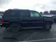 2003 Cadillac Escalade z VIN 1GYEK63NX3R280787, wystawiony jako IAAI lot #41209146 z przebiegiem Nie podano mil oraz . Historia ofert i sprzedaży dostępna na DreamBid. Obrazek 14.