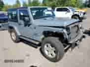 2015 Jeep Wrangler Sport with VIN 1C4AJWAG7FL613059, listed as a Copart auction lot 69094475 with 105,891 mi miles and Salvage title. Bid and sale history available at DreamBid. Image 4.