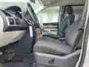 2009 Dodge Grand Caravan SXT with VIN 2D8HN541X9R663326, listed as a Copart auction lot 80393705 with 122,228 mi miles and Salvage title. Bid and sale history available at DreamBid. Image 7.
