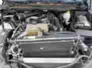 2014 Ram 1500 Laramie z VIN 1C6RR7NM9ES421588, wystawiony jako Copart lot #81893985 z przebiegiem 231 749 mil mil oraz Szkoda całkowita • Salvage title. Historia ofert i sprzedaży dostępna na DreamBid. Obrazek 11.