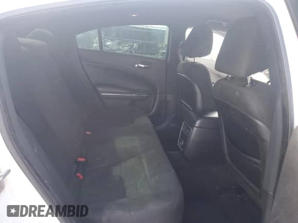 2013 Dodge Charger SE z VIN 2C3CDXBG8DH734850, wystawiony jako Copart lot #84279015 z przebiegiem 239 305 mil mil oraz Czysty tytuł • Clean title. Historia ofert i sprzedaży dostępna na DreamBid. Obrazek 10.