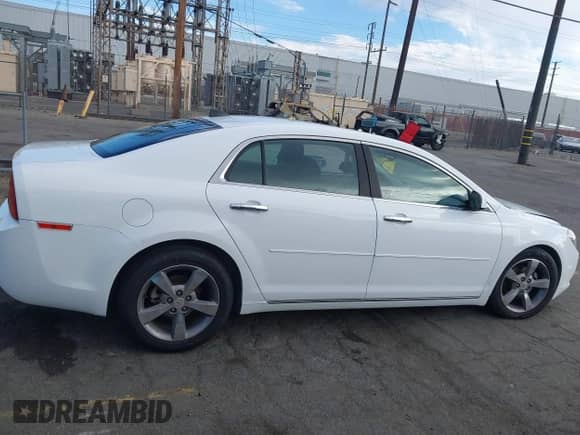 2012 Chevrolet Malibu 1LT z VIN 1G1ZC5E07CF110980, wystawiony jako IAAI lot #43422406 z przebiegiem 91 381 mil mil oraz . Historia ofert i sprzedaży dostępna na DreamBid. Obrazek 13.