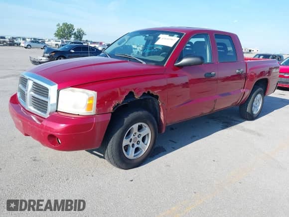 2006 Dodge Dakota SLT с VIN 1D7HW48N06S519934, выставлен на аукционе IAAI как лот 42641967 с пробегом 160 104 миль миль и . История ставок и продаж доступна на DreamBid. Изображение 2.