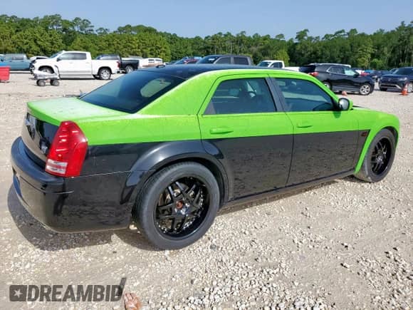 2009 Chrysler 300 C Hemi с VIN 2C3KA63T89H572011, выставлен на аукционе Copart как лот 62315945 с пробегом 97 278 миль миль и Чистый • Clean title. История ставок и продаж доступна на DreamBid. Изображение 3.