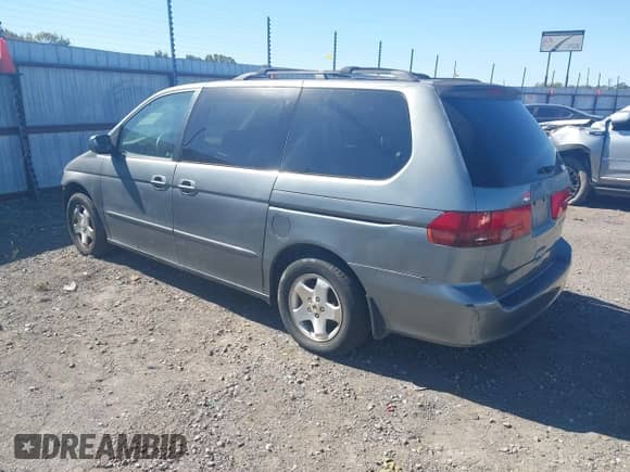 2001 Honda Odyssey EX z VIN 2HKRL18601H610966, wystawiony jako IAAI lot #43380576 z przebiegiem 184 426 mil mil oraz . Historia ofert i sprzedaży dostępna na DreamBid. Obrazek 3.