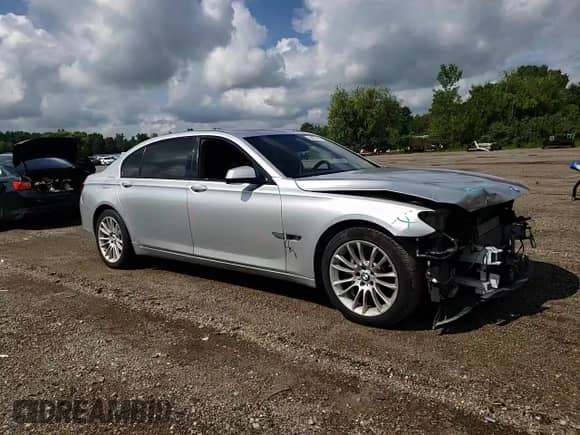 2011 BMW 7 Series 750Li with VIN WBAKB8C52BCY65205, listed as a Copart auction lot 66827495 with 96,168 mi miles and Salvage title. Bid and sale history available at DreamBid. Image 14.